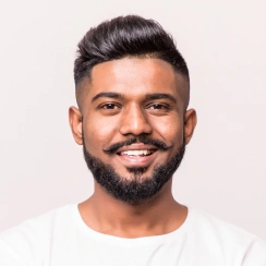 Man with mustache smiling